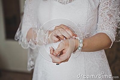 Girl button bracelet pearls on your wrist 8866. Stock Photo