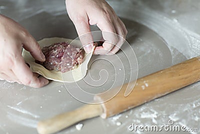 The process of sculpting meat dumplings. Stock Photo