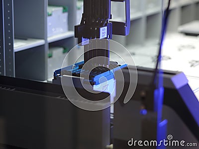 Blue processing DNA laboratory equipment Editorial Stock Photo