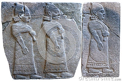 Procession of palace officials - ancient stone bas-relief Editorial Stock Photo