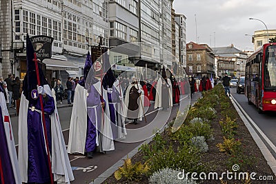 La Coruna, Spain - APRIL 8, 2022: Santa Semana, Procession through the streets of the city in costumes Editorial Stock Photo