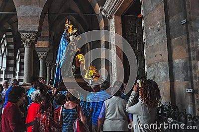 Procession with transport of the statue of the Madonna Editorial Stock Photo