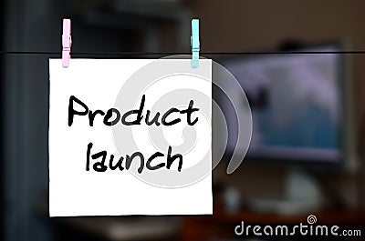 Product launch. Note is written on a white sticker that hangs wi Stock Photo