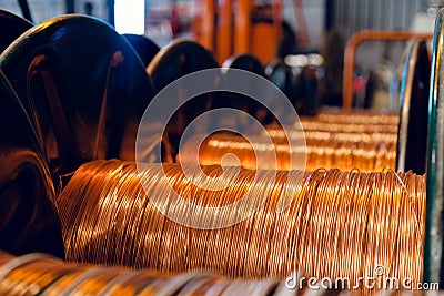 Production of copper wire, cable in reels at factory. Cable factory. Stock Photo