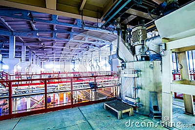 Production facilities with tank at factory producing blocks Stock Photo