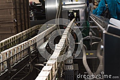 production of juices in cardboard packaging. Industry, Metal Works. Stock Photo