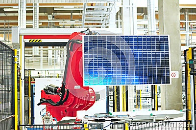 production of solar cells assembled in a high tech factory - work robot Stock Photo