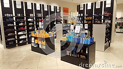 Products for beauty and body care. Perfumes. Shop shelves Editorial Stock Photo