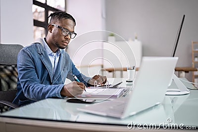 Professional Accountant Man In Office Doing Accounting Stock Photo