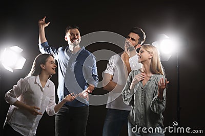 Professional actors rehearsing on stage in theatre Stock Photo