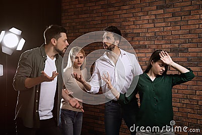 Professional actors rehearsing in theatre Stock Photo