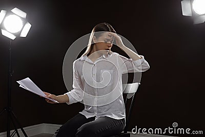 Professional actress rehearsing on stage Stock Photo