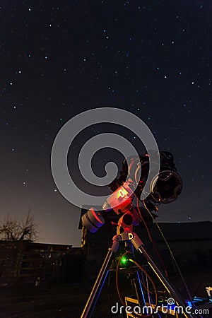 Professional astrophotography telescope equipped with guider scope and astro camera Stock Photo