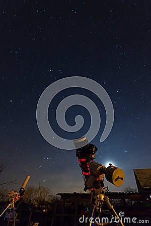 Professional astrophotography telescope equipped with guider scope and astro camera Stock Photo