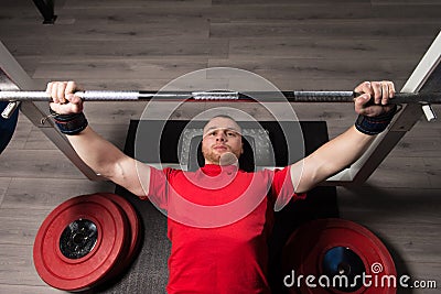 Athlete of Powerlifter Attempt Benchpress a Heavy Barbell Stock Photo