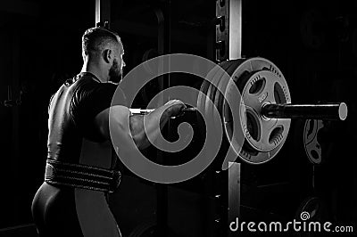 Professional athlete prepares to squat with a barbell Stock Photo