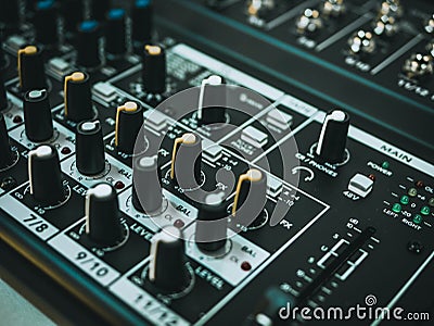 Professional audio equipment with faders knobs and buttons Stock Photo