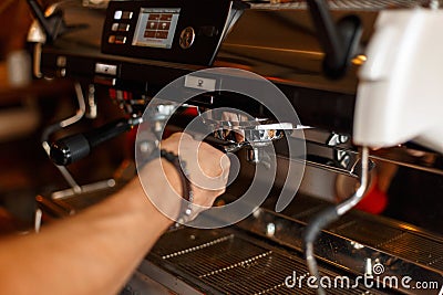 Barista preparing espresso, coffee making process Stock Photo