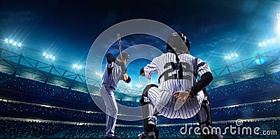 Professional baseball players on night grand arena Stock Photo