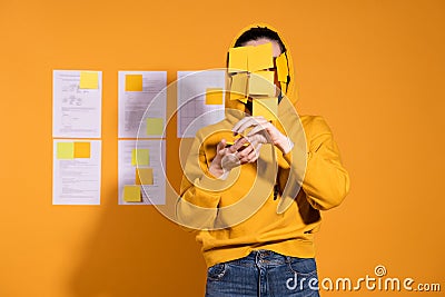 Professional burnout, the project manager is inundated with a large number of reminders, Stock Photo