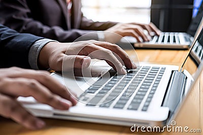 Professional businessman working, Doing finance on laptop, document graph and analysis business strategy to development profit Stock Photo