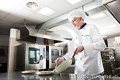 Professional chef at work Stock Photo