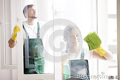 Professional cleaners cleaning windows Stock Photo