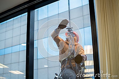 Professional cleaning for hight building, Cleaning building glasses Stock Photo