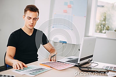 Professional colorist working with color palettes Stock Photo