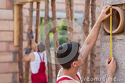 Professional construction workers Stock Photo