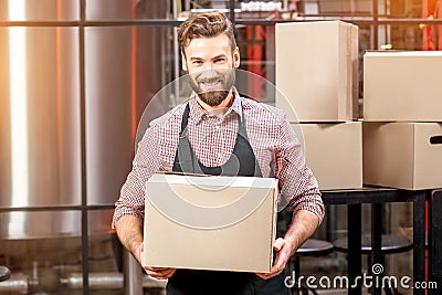 Professional courier with boxes Stock Photo