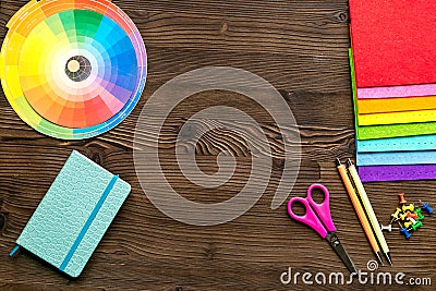 Professional creative graphic designer desk on wooden background top view mockup Stock Photo