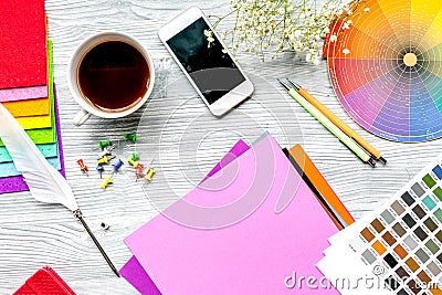 Professional creative graphic designer desk on wooden background top view Stock Photo