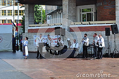 Professional dancers in folk costume from ,TÃ¢rgu Ji. 1 Editorial Stock Photo