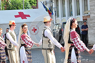 Professional dancers in folk costume from ,TÃ¢rgu Jiu. 2 Editorial Stock Photo