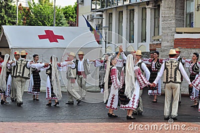 Professional dancers in folk costume from ,TÃ¢rgu Jiu. 4 Editorial Stock Photo