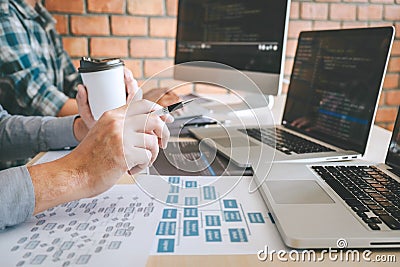 Professional Developer programmer cooperation meeting and brainstorming and programming in website working a software outsourcing Stock Photo