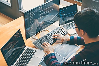 Professional Development programmer working in programming website a software and coding technology, writing codes and data Stock Photo