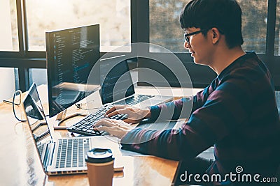 Professional Development programmer working in programming website a software and coding technology, writing codes and data code, Stock Photo