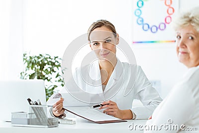 Professional dietician during nutrition consultation Stock Photo