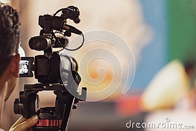 Professional digital camera recording video in music concert festival Stock Photo