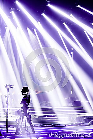 Professional digital video camera, tv camera in a concert hall Stock Photo