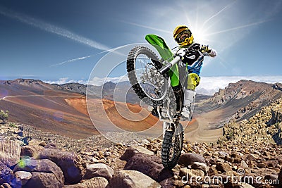 Professional dirt bike rider doing wheely Stock Photo