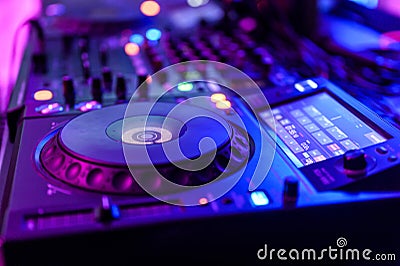 Professional DJ Equipment sound and audio mixer control panel with buttons and sliders Stock Photo