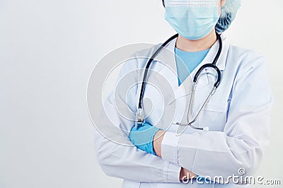 Professional doctor doing arms crossed gesture for build confidence in patients on white background. Medical personnel and Health Stock Photo