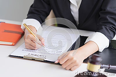 Professional female lawyers working at the law firms. Judge gavel. Legal law, lawyer, advice and justice concept. Stock Photo