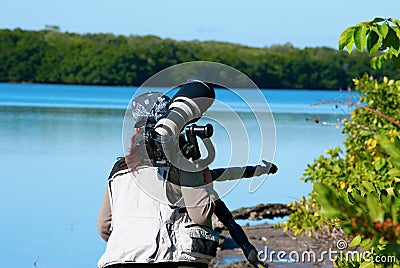 Professional female nature photographer Stock Photo