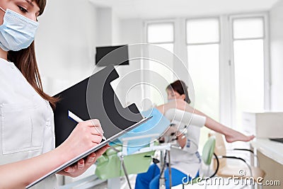 Professional gynecologist examining her patient Stock Photo