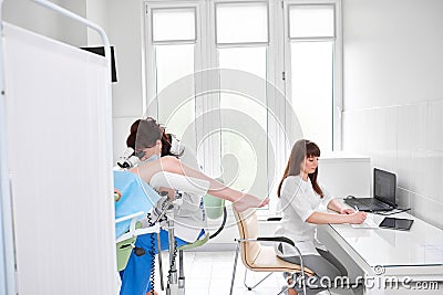 Professional gynecologist examining her patient Stock Photo