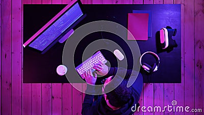 Professional hacker using mobile cell phone talking and spreading bad data virus online. Stock Photo